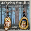 Saw-whet Owl one perched and one in tree hole Earrings
